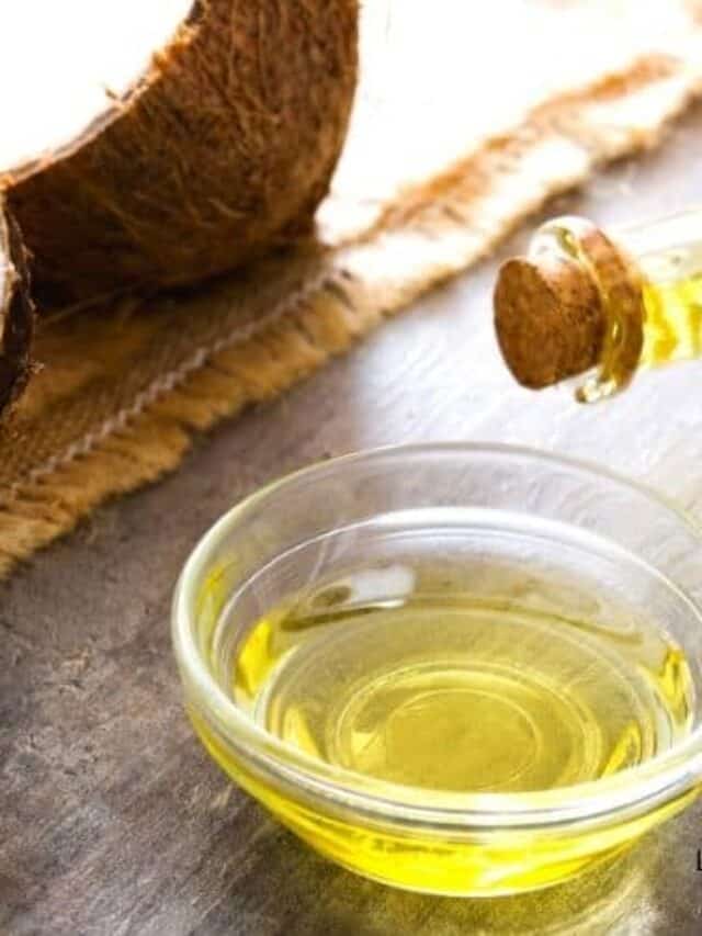 cracked open coconut and olive oil in bowl