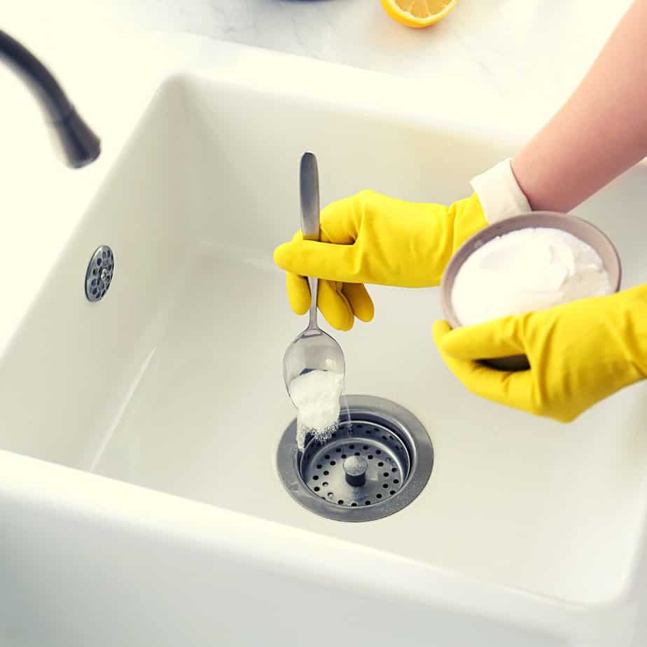 10+ Unusual Uses for Baking Soda on Your Homestead - cleaning a drain