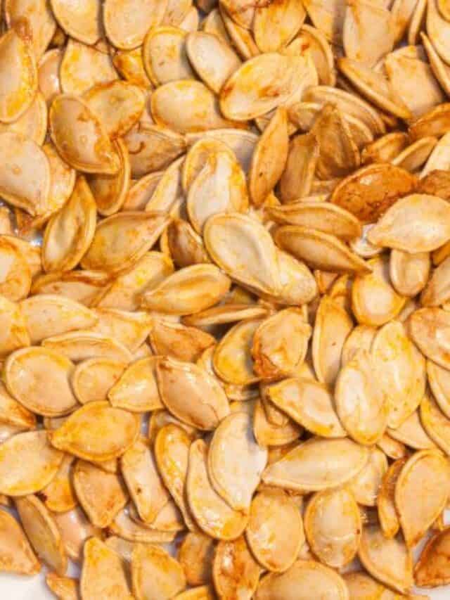 roasted pumpkin seeds in white dish