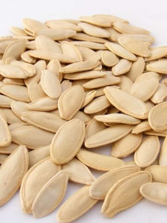 pumpkin seeds on white background