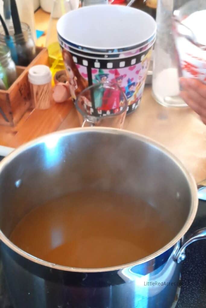 dandelion syrup simmering in large pot